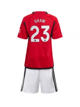 Billige Manchester United Luke Shaw #23 Hjemmedraktsett Barn 2023-24 Kortermet (+ Korte bukser)